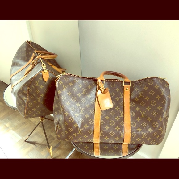 Louis Vuitton Handbags - Louis Vuitton duffle bag great condition